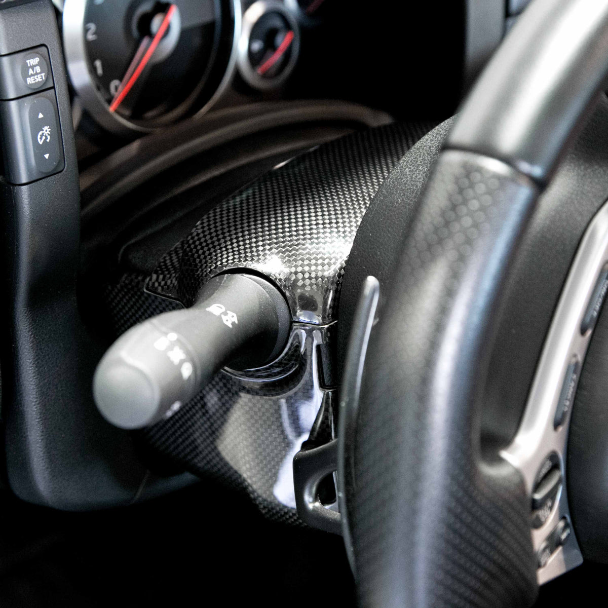 Seibon Carbon Fiber steering column surround trim for 2009-2016 Nissan GT-R (4-Piece Set)