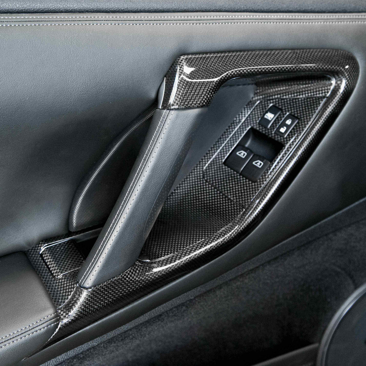 Seibon Carbon Fiber interior door trim set for 2009-2016 Nissan GT-R (12-Piece Set)