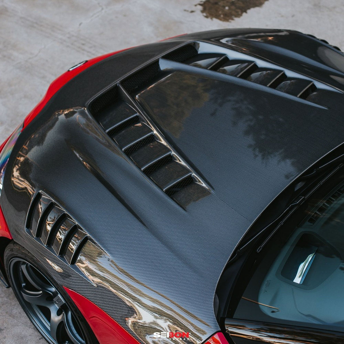 Seibon TV-style double sided carbon fiber hood for 2020-2026 Toyota GR Supra