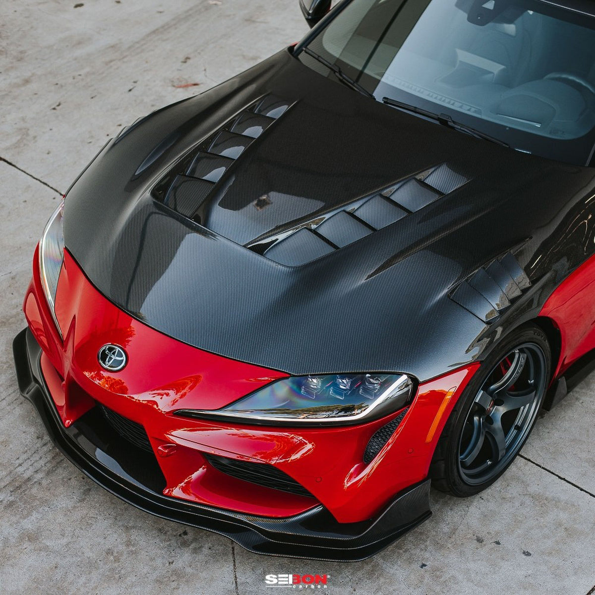 Seibon TV-style double sided carbon fiber hood for 2020-2026 Toyota GR Supra